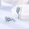 Boucles d'oreilles argent massif zirconium bleu et jaune design floral